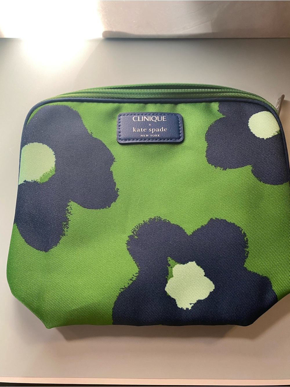 Clinique Green Floral Zip Cosmetic Pouch with Navy Accents